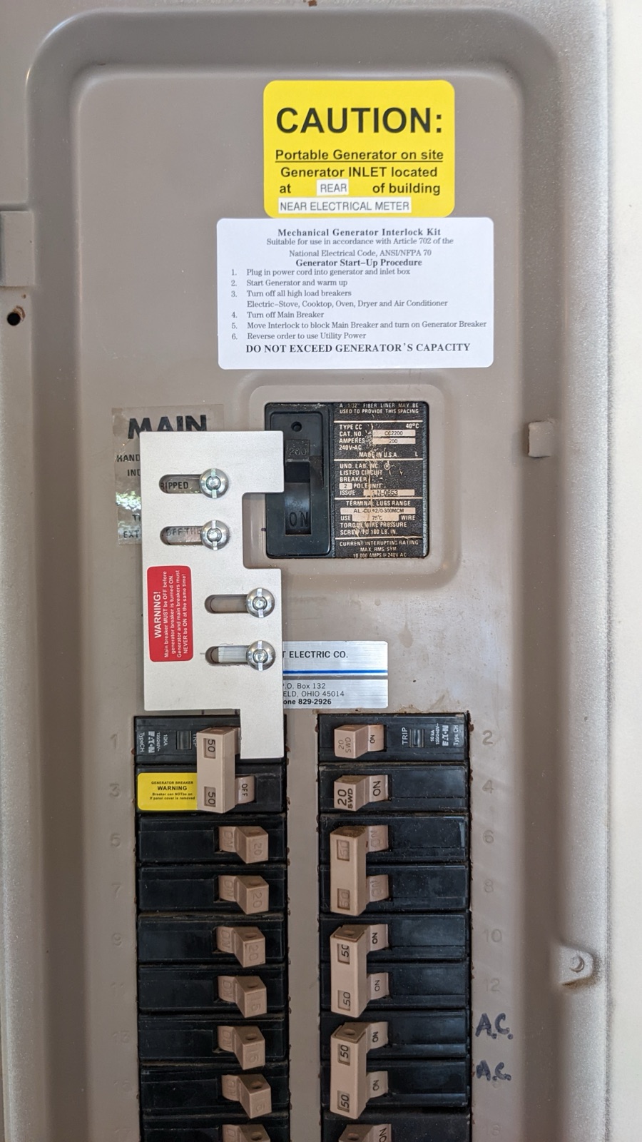 Generator interlock kit installed on a residential breaker panel