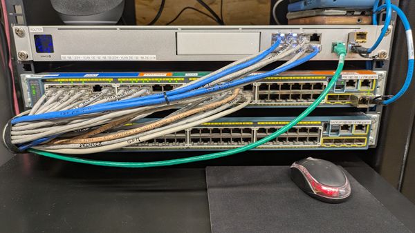 Network switches and patch cabling in a low-voltage data rack