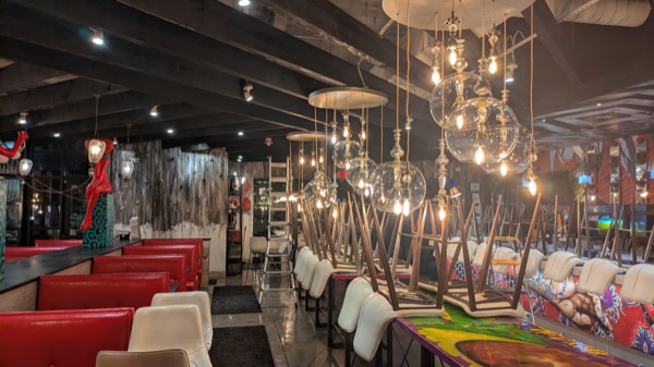 Decorative dining-room lighting in a finished restaurant interior