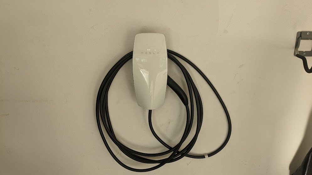 Tesla Wall Connector installed by Benrishi Electrical in a West Chester garage
