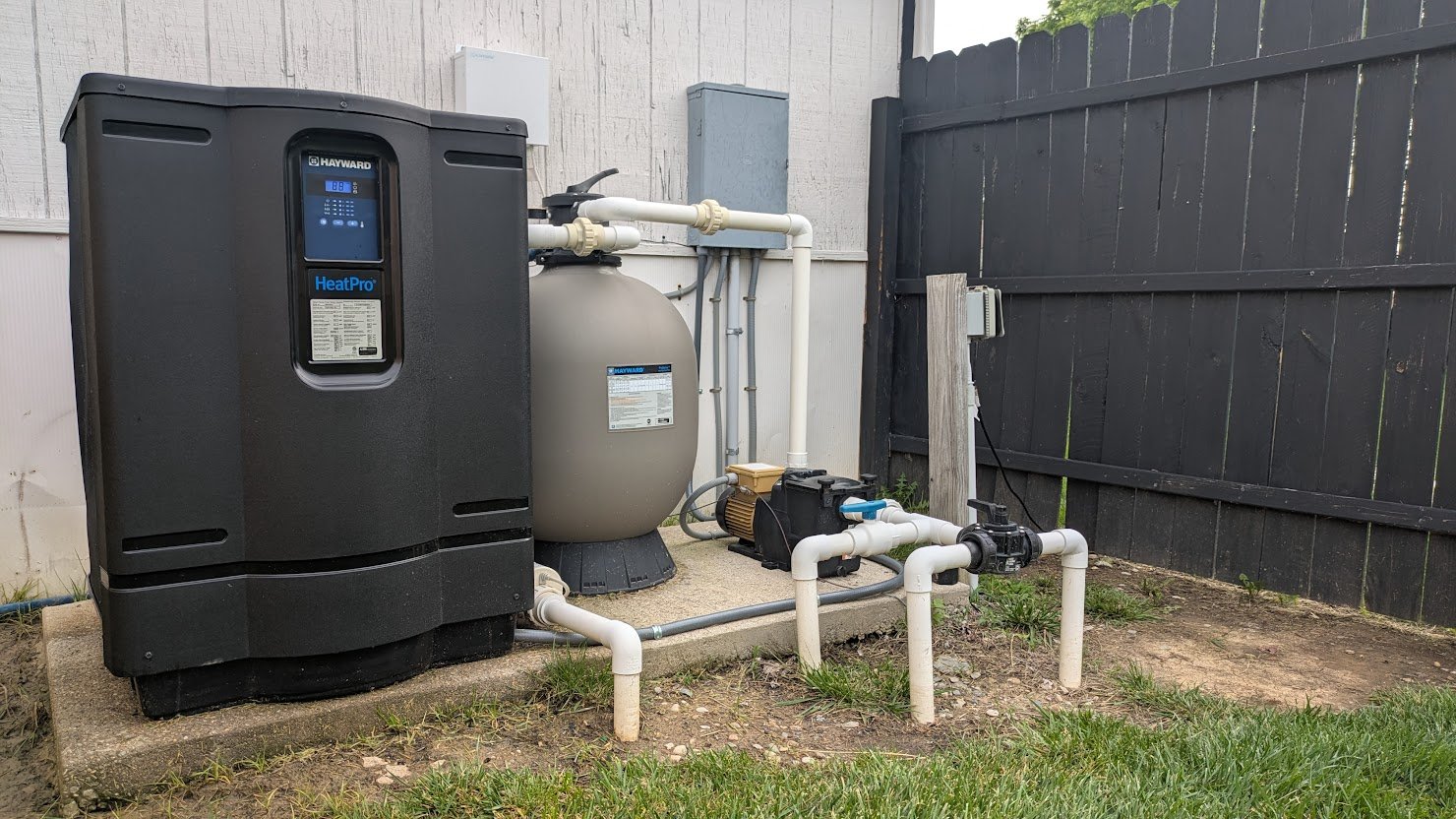 Benrishi Electrical pool equipment service: Hayward heat pump, filter, pump, and PVC manifold serviced at customer home