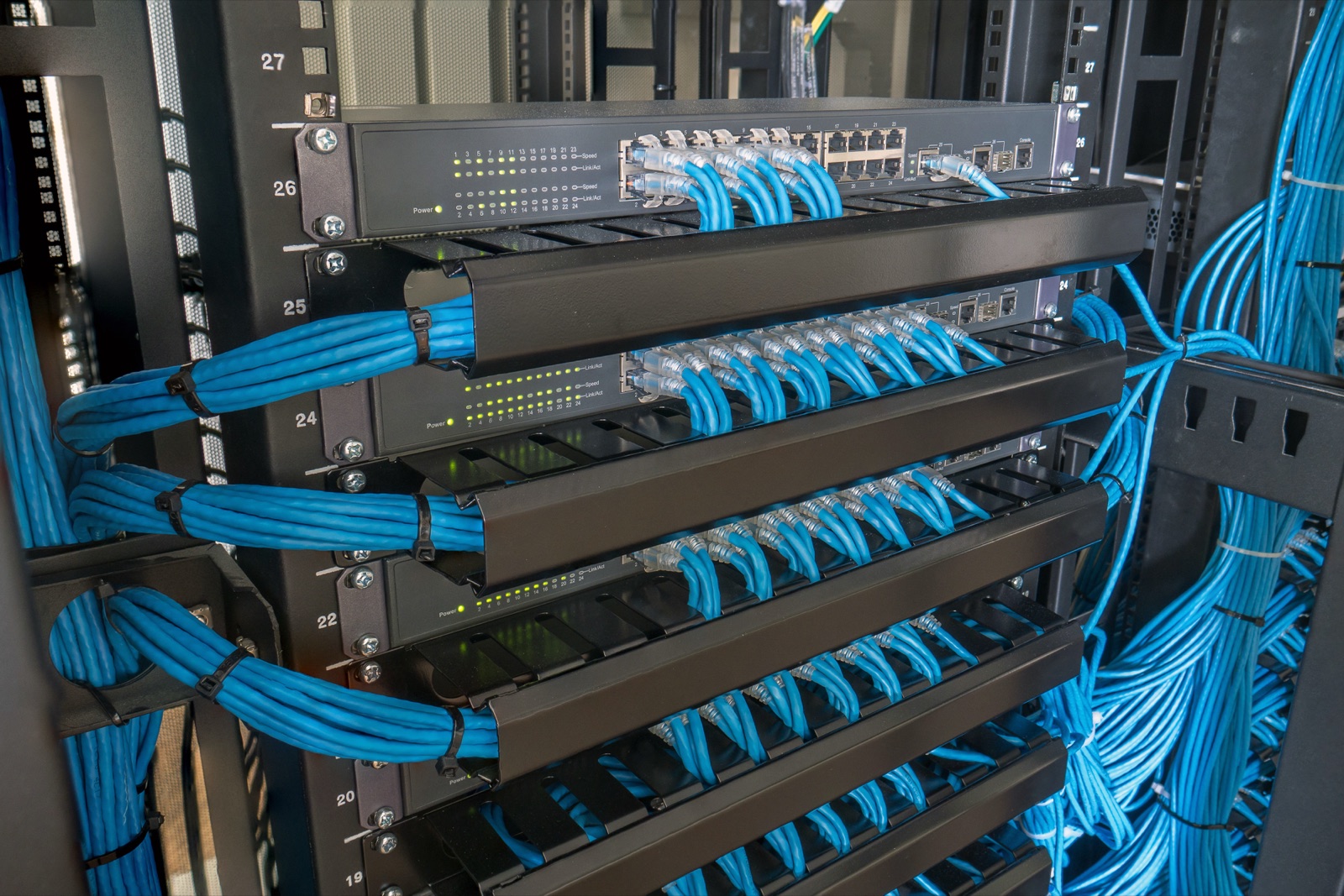 Structured network rack with patch panels and Cat6 cabling installed by Benrishi Electrical