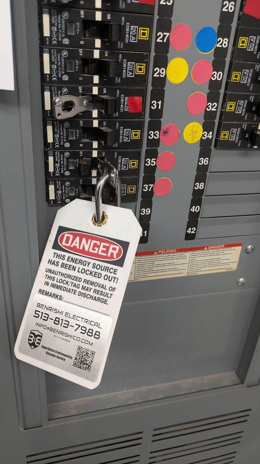Benrishi Electrical lockout-tagout safety tag on a commercial panel