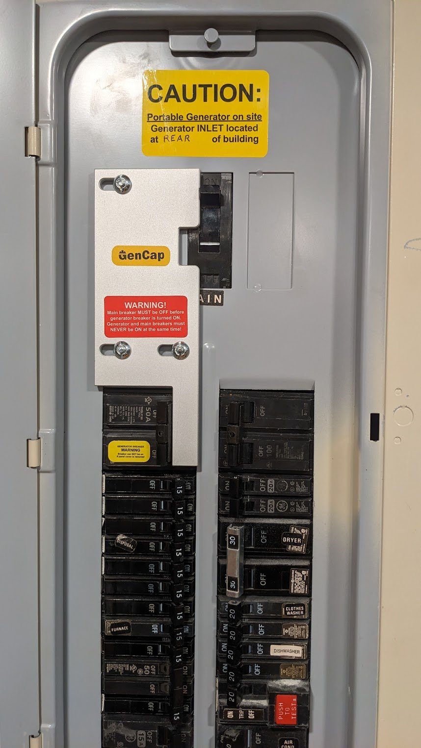 Generator interlock kit installed on a residential breaker panel by Benrishi Electrical