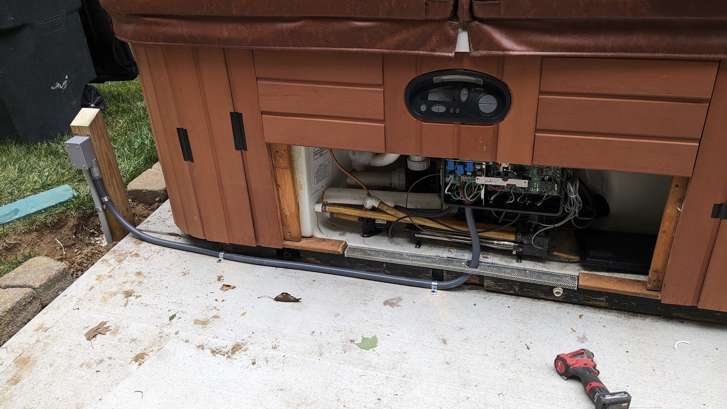 Weatherproof spa disconnect and conduit run installed by Benrishi Electrical